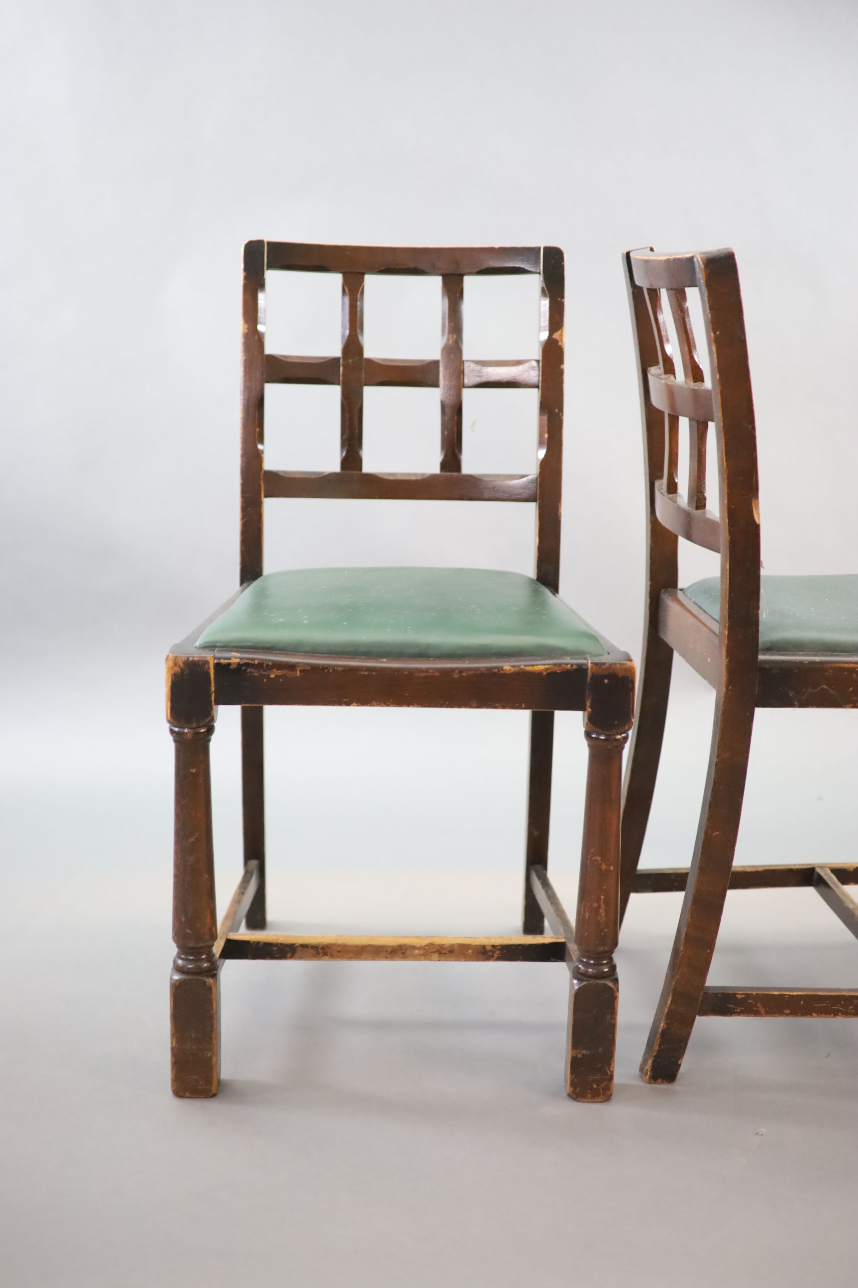 A set of ten early 20th century oak and beech dining chairs